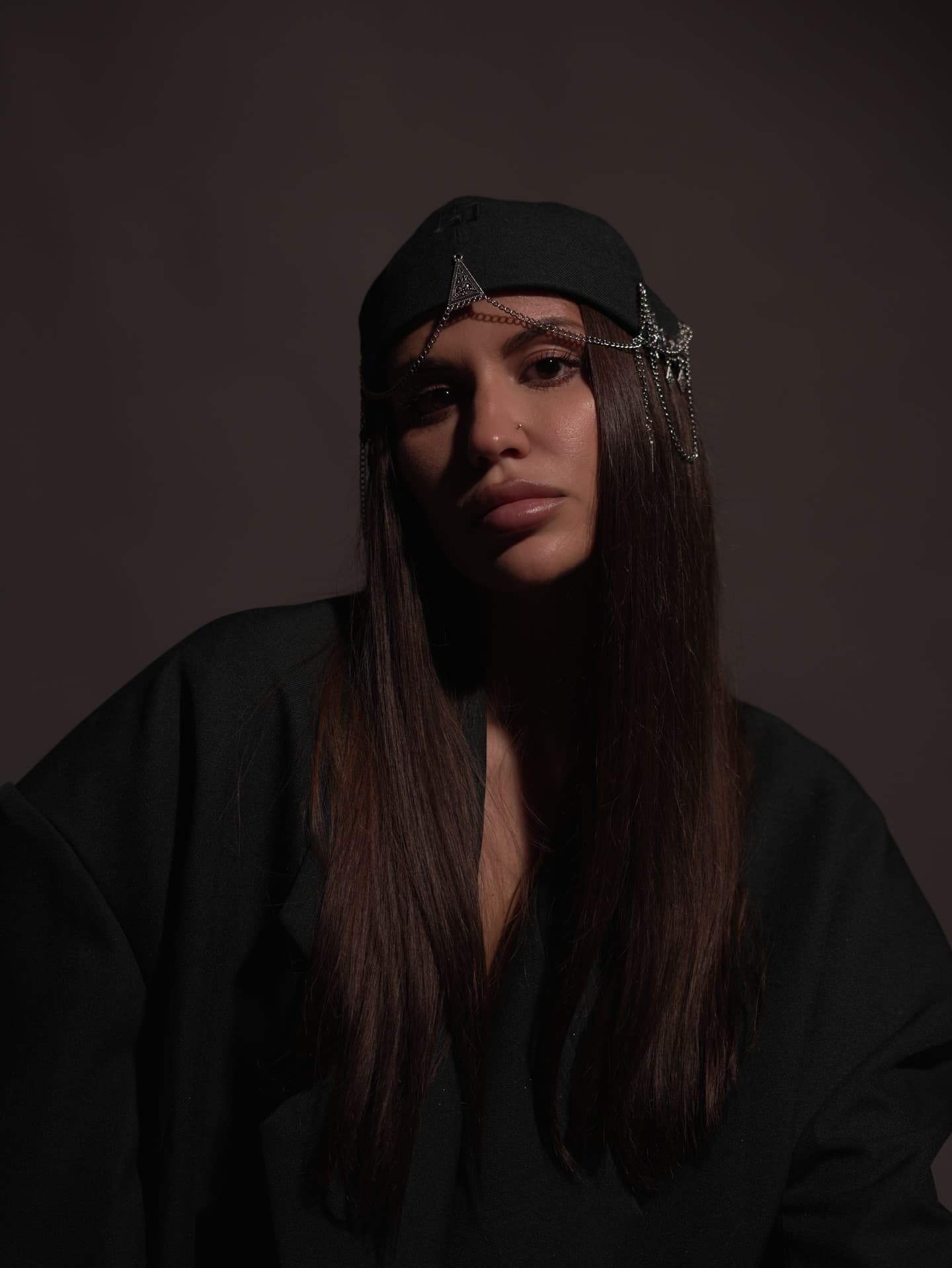 Portrait of Regina in a dark fashion editorial