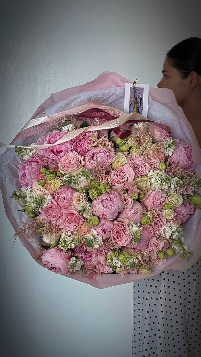 Sculptural Holy Chic signature bouquet in soft blush and wine tones
