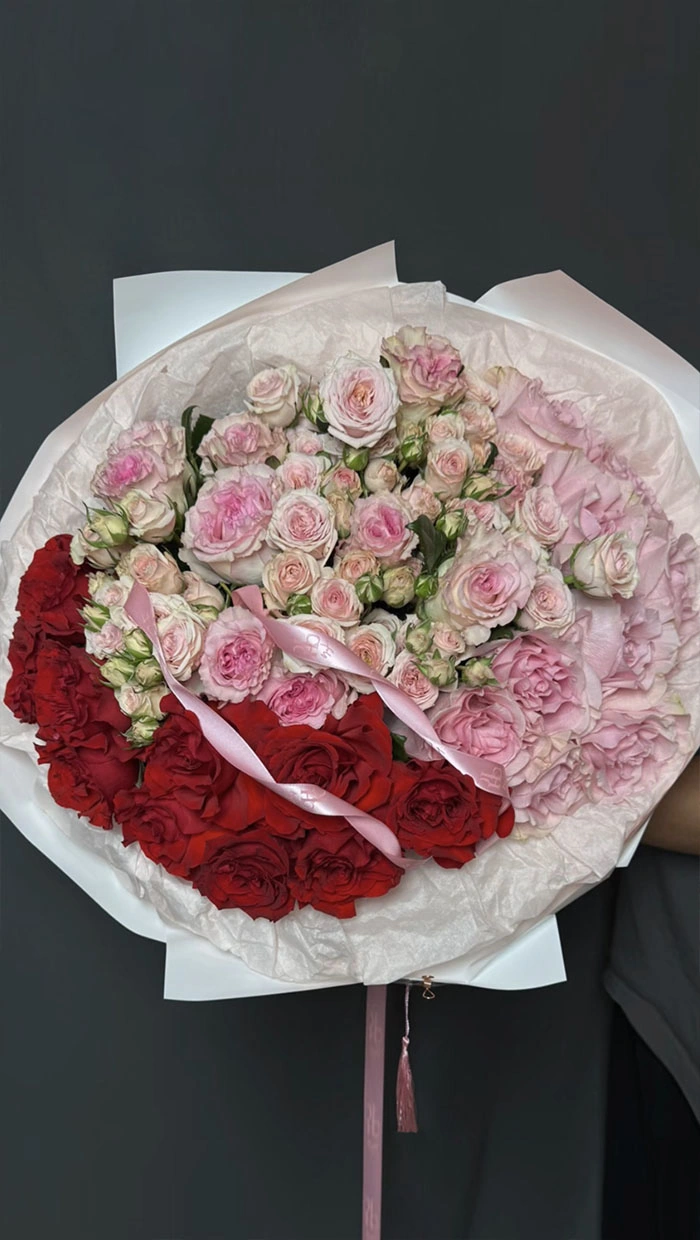 A bold, vibrant bouquet of mixed roses