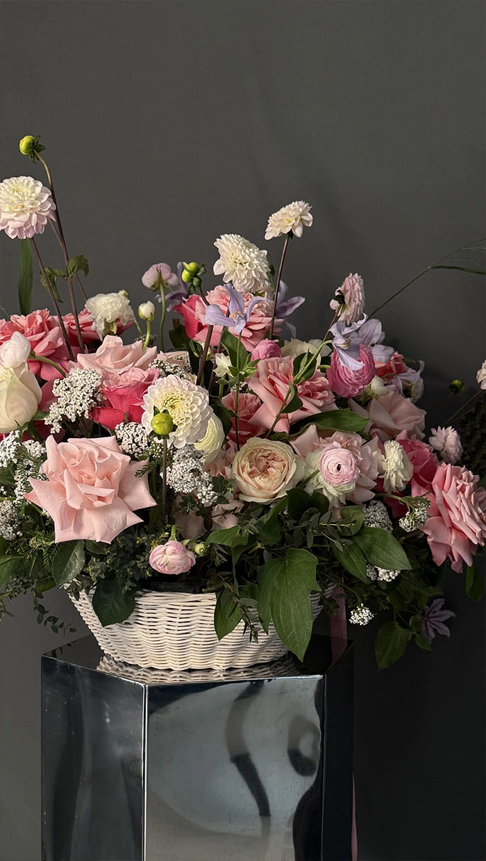 A festive basket of garden flowers in English style