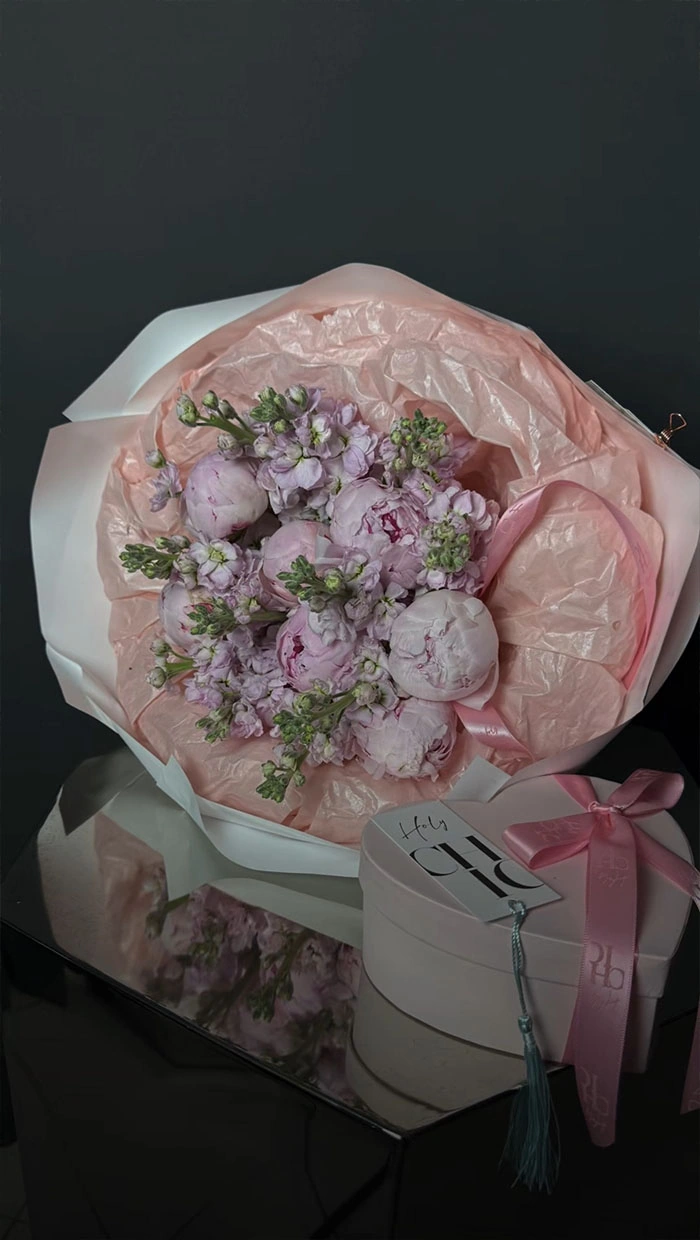 A fragrant heavenly bouquet of peonies and stock flowers