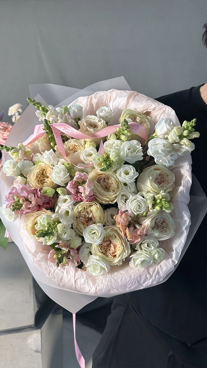 Peony roses and a summer garden mix