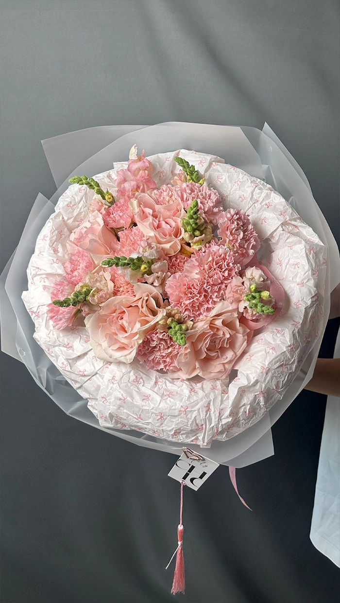 A princess bouquet of dianthus and garden flowers